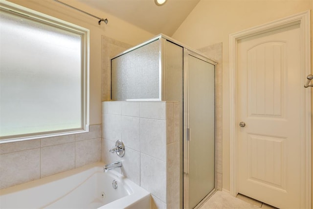 4501 NW 164th Ter, Edmond, OK 73013 - bathroom featuring a stall shower, a tub with jets, and lofted ceiling