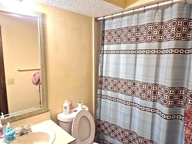 3120 Del Rey Dr, Midwest City, OK 73110 - bathroom with a textured wall, vanity, a shower with curtain, and a textured ceiling