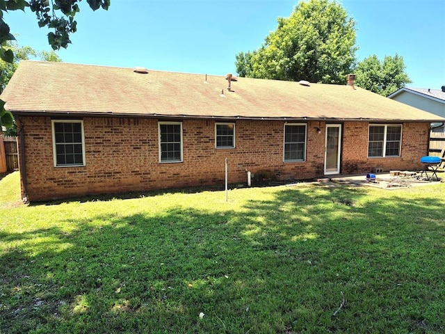 3120 Del Rey Dr, Midwest City, OK 73110 - rear view of property featuring brick siding, a patio area, and roof with shingles