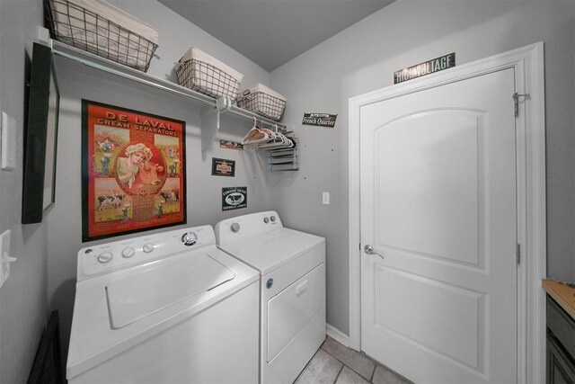 1840 Kamber Ter, Edmond, OK 73003 - washroom with separate washer and dryer and light tile patterned floors