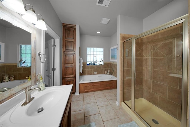 1840 Kamber Ter, Edmond, OK 73003 - bathroom with vanity, a bath, a shower stall, tile patterned floors, and recessed lighting