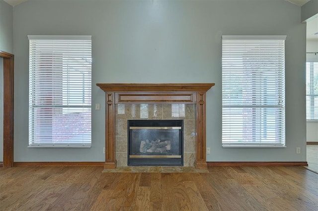 5404 NW 119th St, Oklahoma City, OK 73162 - detailed view of wood finished floors and a fireplace