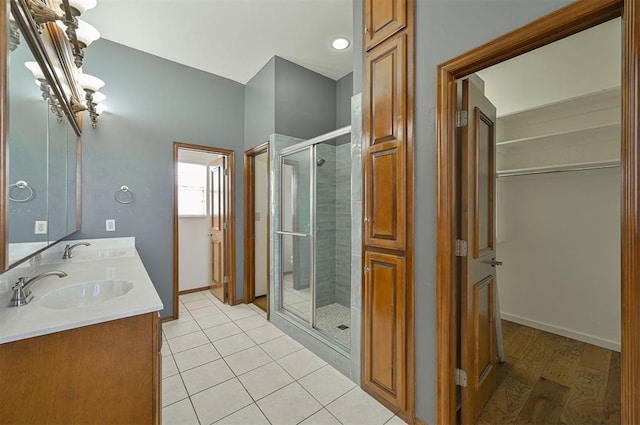 5404 NW 119th St, Oklahoma City, OK 73162 - full bath with a stall shower, double vanity, and tile patterned flooring