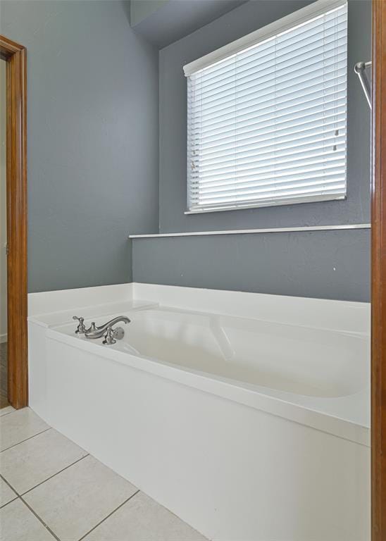 5404 NW 119th St, Oklahoma City, OK 73162 - bathroom featuring a bath and tile patterned floors