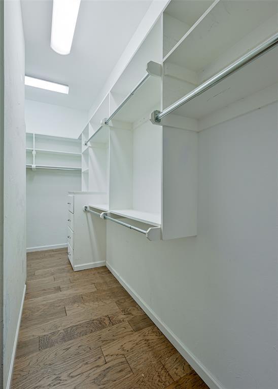 5404 NW 119th St, Oklahoma City, OK 73162 - spacious closet with wood finished floors