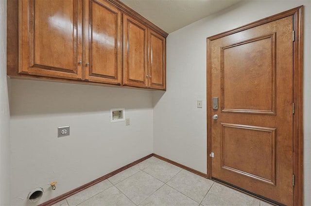 5404 NW 119th St, Oklahoma City, OK 73162 - washroom with hookup for an electric dryer, washer hookup, cabinet space, light tile patterned floors, and hookup for a gas dryer