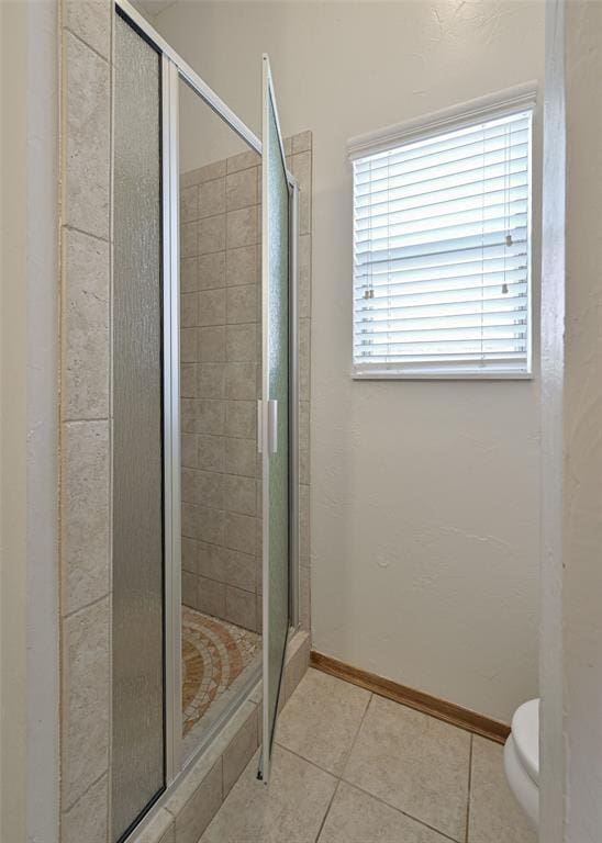 5404 NW 119th St, Oklahoma City, OK 73162 - full bathroom featuring a stall shower and tile patterned flooring