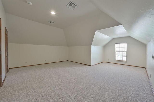 5404 NW 119th St, Oklahoma City, OK 73162 - bonus room with lofted ceiling, light colored carpet, and recessed lighting
