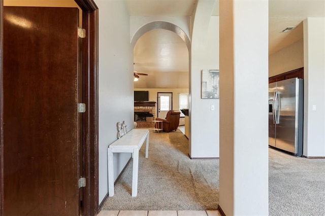 2001 Fair Meadow Dr, Edmond, OK 73003 - hall featuring light colored carpet and arched walkways