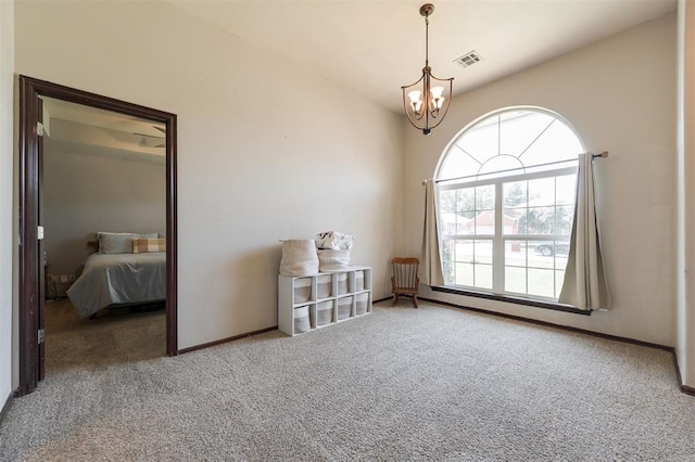 2001 Fair Meadow Dr, Edmond, OK 73003 - carpeted spare room with a chandelier and baseboards
