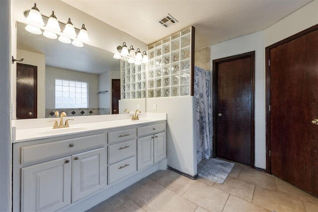 2001 Fair Meadow Dr, Edmond, OK 73003 - bathroom featuring double vanity