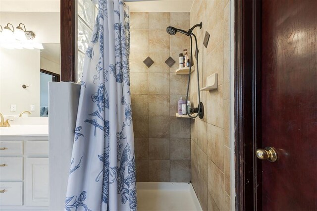 2001 Fair Meadow Dr, Edmond, OK 73003 - bathroom with a tile shower and vanity