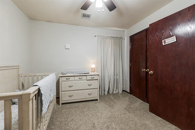 2001 Fair Meadow Dr, Edmond, OK 73003 - carpeted bedroom with ceiling fan