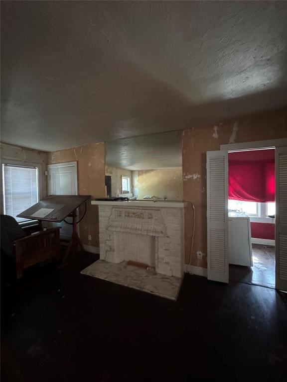2701 NW 12th St, Oklahoma City, OK 73107 - living area featuring baseboards