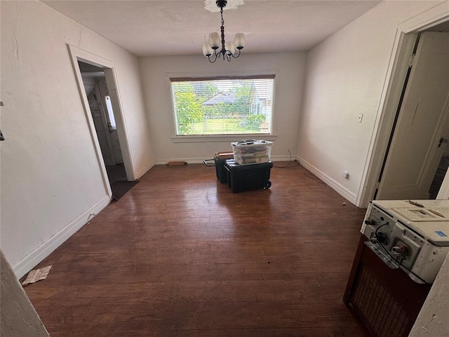 2701 NW 12th St, Oklahoma City, OK 73107 - dining room featuring dark wood-style floors and a chandelier