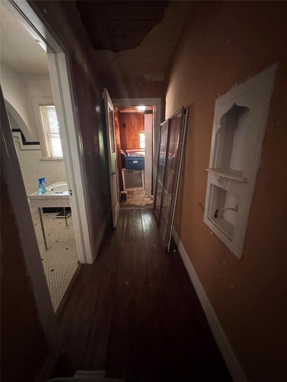 2701 NW 12th St, Oklahoma City, OK 73107 - hallway with wood finished floors and baseboards