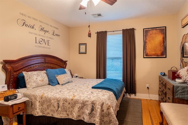 828 N Pine St, Pauls Valley, OK 73075 - bedroom featuring wood finished floors and a ceiling fan