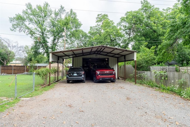828 N Pine St, Pauls Valley, OK 73075 - view of vehicle parking with a carport
