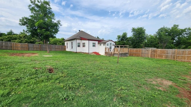 1401 W College Ave, Guthrie, OK 73044 - fenced backyard featuring a deck