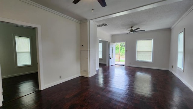 1401 W College Ave, Guthrie, OK 73044 - empty room with ceiling fan, dark wood-style floors, plenty of natural light, and crown molding