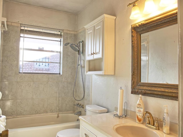 2605 N Kate Ave, Oklahoma City, OK 73111 - bathroom featuring vanity, bathtub / shower combination, and a textured wall