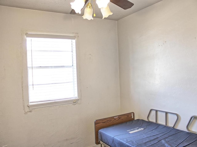 2605 N Kate Ave, Oklahoma City, OK 73111 - bedroom with multiple windows and a ceiling fan