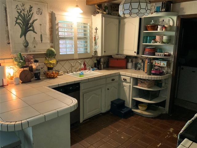 2709 Timber Ct, Chickasha, OK 73018 - kitchen with open shelves, dishwasher, backsplash, and tile counters
