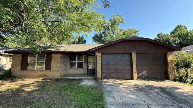 3308 Resh Ct, Norman, OK 73072 - ranch-style home featuring a garage, concrete driveway, and brick siding