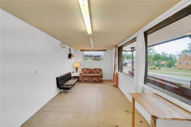 207 E Pine Ave, Sayre, OK 73662 - sunroom / solarium with tile patterned floors