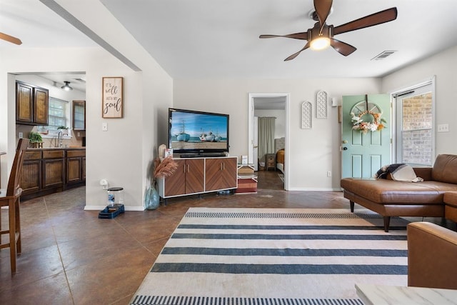 275 S Ranchette Rd, Mead, OK 73449 - living area featuring a ceiling fan and concrete flooring