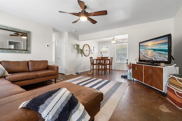 275 S Ranchette Rd, Mead, OK 73449 - tiled living room with a ceiling fan and baseboards