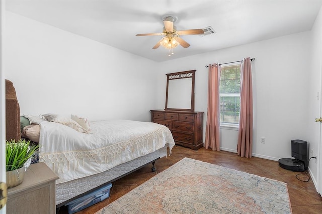 275 S Ranchette Rd, Mead, OK 73449 - tiled bedroom featuring ceiling fan and baseboards