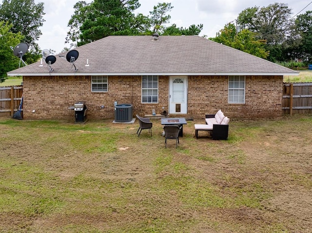 275 S Ranchette Rd, Mead, OK 73449 - rear view of property with brick siding, roof with shingles, and an outdoor fire pit