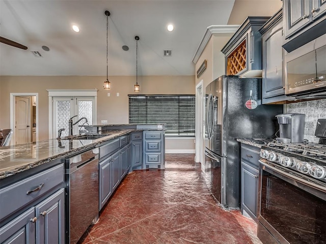 19855 Walker Rd, Mcloud, OK 74851 - kitchen featuring stainless steel appliances, gray cabinetry, dark stone counters, tasteful backsplash, and decorative light fixtures