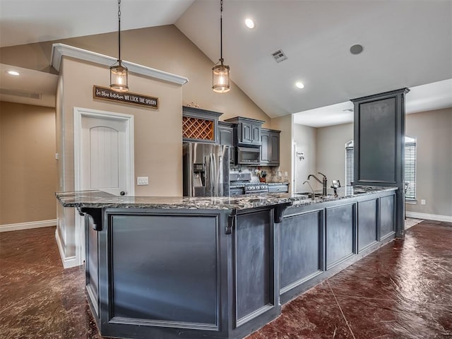 19855 Walker Rd, Mcloud, OK 74851 - kitchen with stainless steel appliances, a kitchen breakfast bar, dark stone countertops, pendant lighting, and high vaulted ceiling