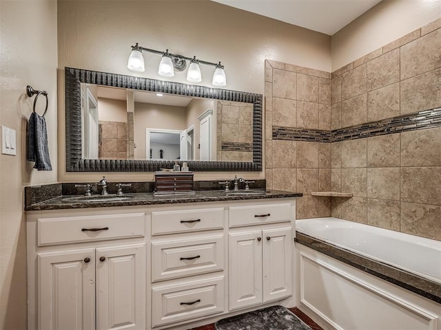 19855 Walker Rd, Mcloud, OK 74851 - full bathroom with a tub to relax in, double vanity, and tile walls
