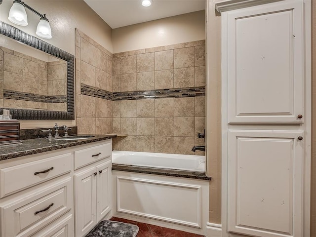 19855 Walker Rd, Mcloud, OK 74851 - bathroom with vanity, washtub / shower combination, tile patterned flooring, and recessed lighting