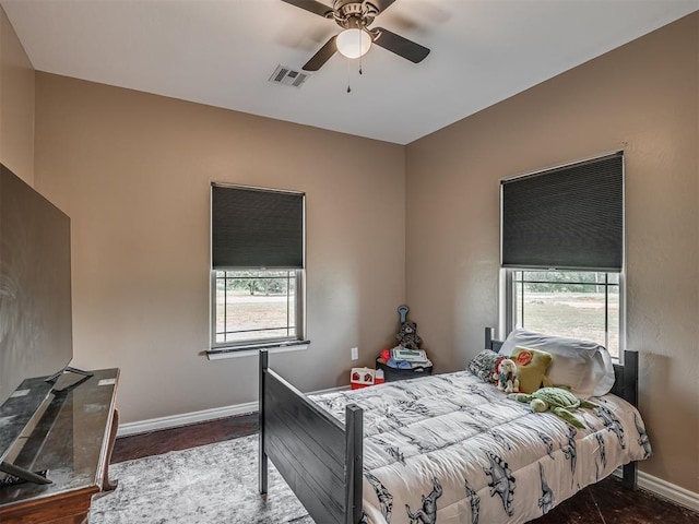 19855 Walker Rd, Mcloud, OK 74851 - bedroom featuring multiple windows and ceiling fan