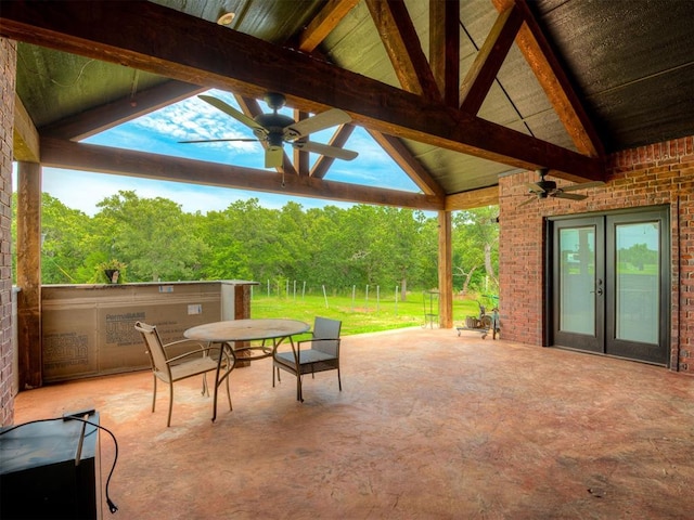 19855 Walker Rd, Mcloud, OK 74851 - view of patio / terrace featuring ceiling fan, french doors, a gazebo, a view of trees, and outdoor dining space