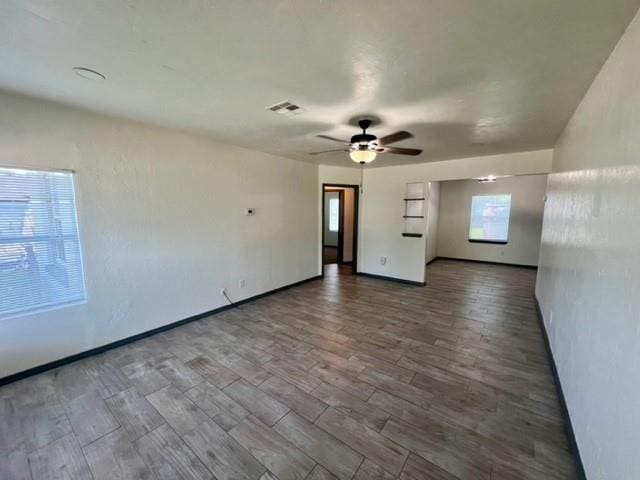 4020 NW 28th St, Oklahoma City, OK 73107 - unfurnished room featuring ceiling fan and wood finished floors
