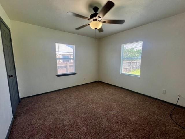 4020 NW 28th St, Oklahoma City, OK 73107 - unfurnished room featuring carpet floors and a ceiling fan