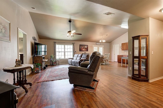 19100 SE 134th St, Mcloud, OK 74851 - living room with lofted ceiling, wood finished floors, and a ceiling fan