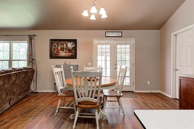 19100 SE 134th St, Mcloud, OK 74851 - dining area featuring healthy amount of natural light, wood finished floors, a chandelier, and french doors
