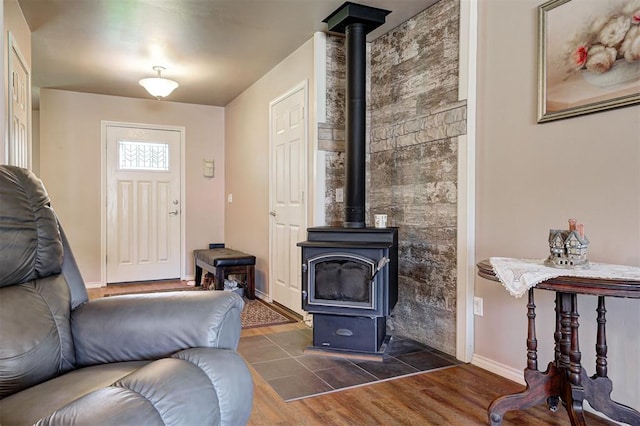 19100 SE 134th St, Mcloud, OK 74851 - living area with a wood stove and wood finished floors