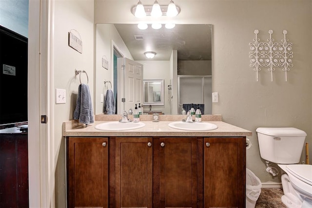 19100 SE 134th St, Mcloud, OK 74851 - bathroom featuring double vanity and an enclosed shower