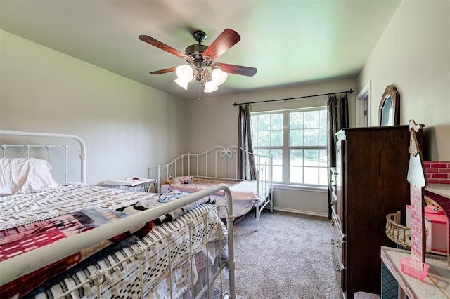 19100 SE 134th St, Mcloud, OK 74851 - carpeted bedroom featuring a ceiling fan and baseboards