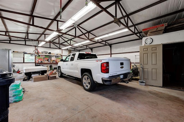 19100 SE 134th St, Mcloud, OK 74851 - garage featuring freestanding refrigerator