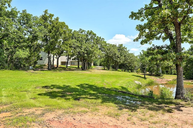 19100 SE 134th St, Mcloud, OK 74851 - view of grassy yard featuring a water view