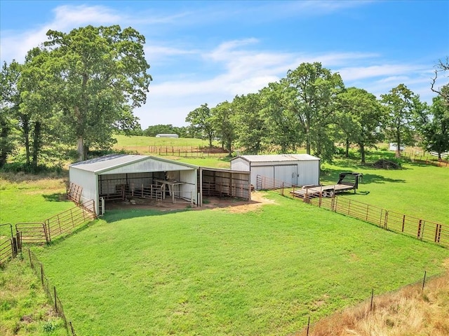 331249 E 1020th Rd, Harrah, OK 73045 - view of yard with an exterior structure, a rural view, and an outbuilding