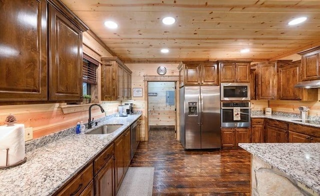 1723 Pine Hills Rd, Broken Bow, OK 74728 - kitchen featuring stainless steel appliances, wooden ceiling, dark wood-style floors, light stone countertops, and under cabinet range hood